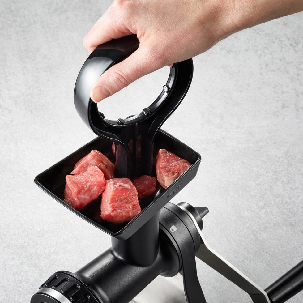 Meat mincer with suction cup 