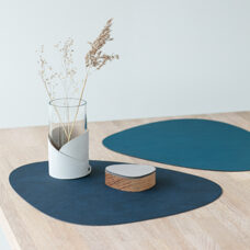 Napperon
bleu foncé/pétrole curbe 37x44 