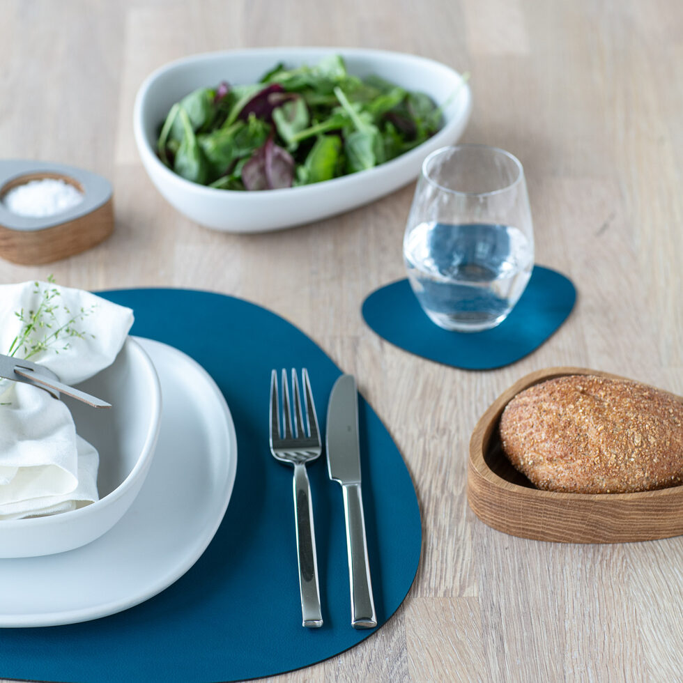 Napperon
bleu foncé/pétrole curbe 37x44 