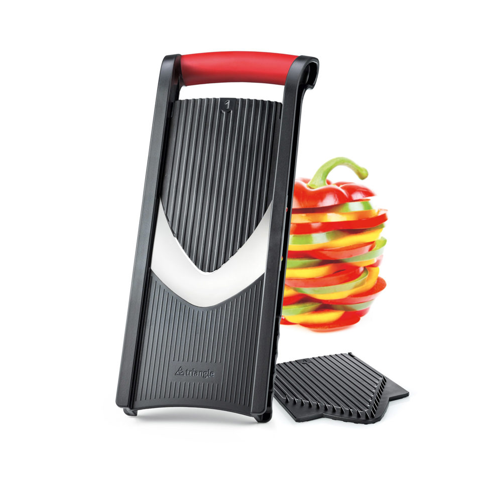 Coupe-légumes avec support pour restes de légumes 