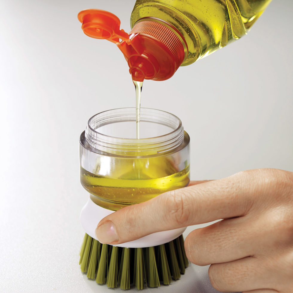 Brosse à bouton avec distributeur gris 